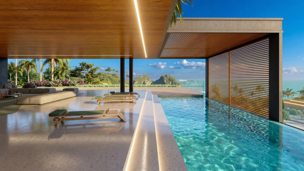 Piscina e área de lazer integradas ao mar em residência de luxo em Governador Celso Ramos, projeto autoral da KRUZ Arquitetura.